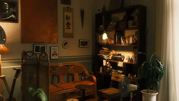 Warm and inviting vintage reading room with bookshelves and natural lighting.